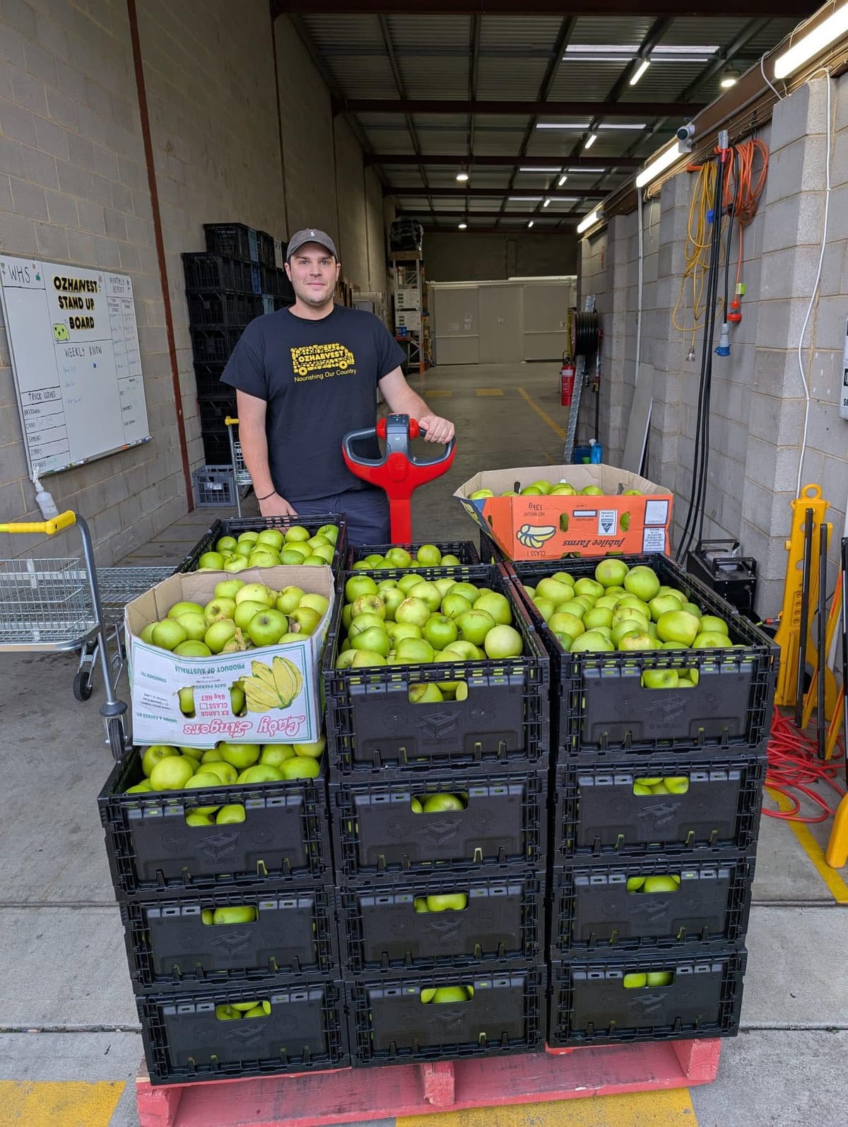 Volunteers delivering fresh produce to a community organisation